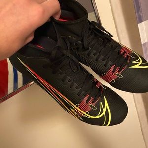 Nike Mercurial Superfly 8 football shoes. Black, yellow and red.